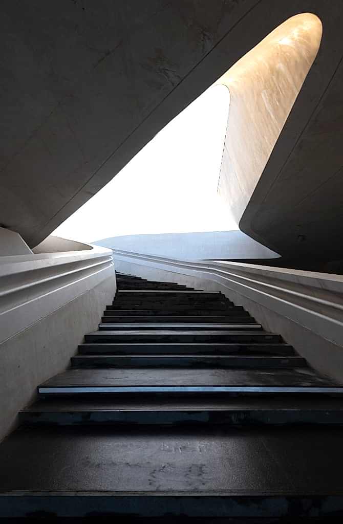 modern-architecture-and-empty-staircase-leading-to-a-bright-open-space.jpg